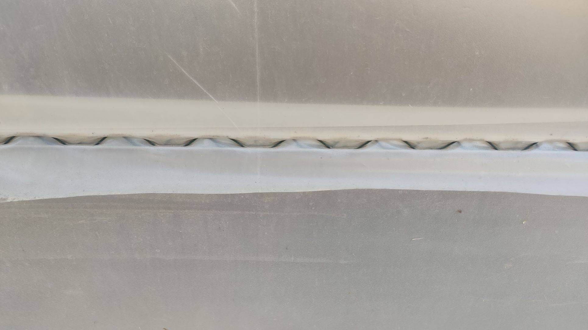 WIGGLE WIRE FOR PLASTIC FILM